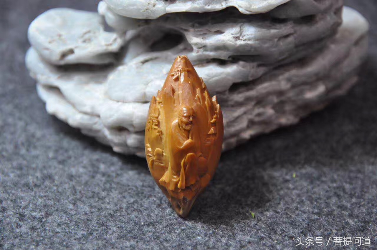 三藏橄榄核雕价位及图片,核雕三藏大师本人照片大全