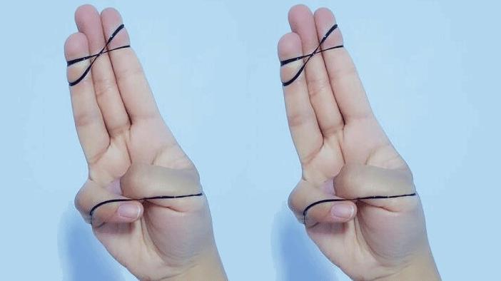 大拇指压住小拇指是什么手势,大拇指压小拇指伸手是什么手势