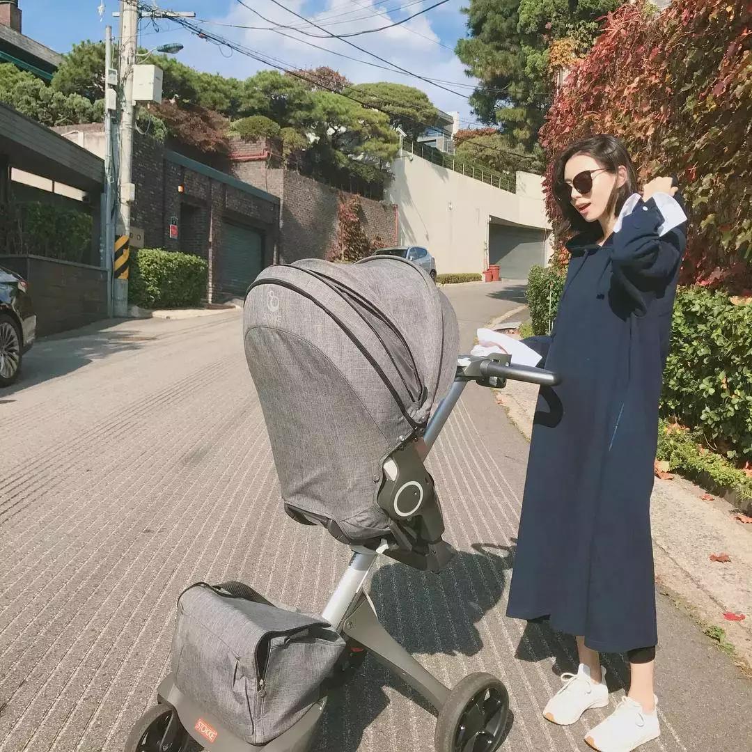 韩国明星穿大衣男,韩国明星都穿什么羽绒服