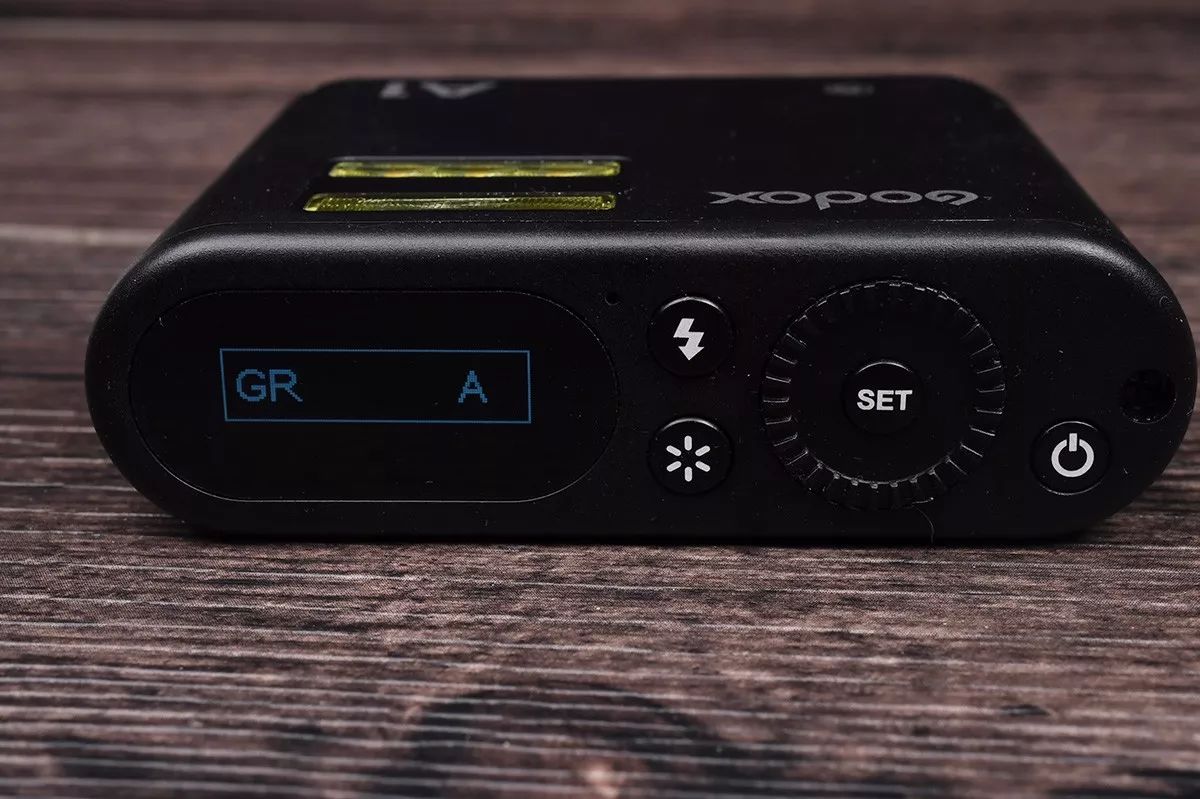 摄影神牛v1闪光灯使用方法,神牛闪光灯a1有效距离多少