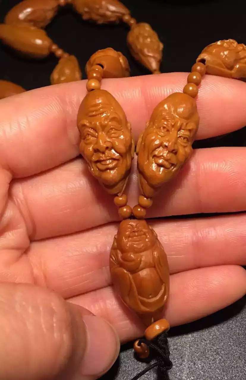 文玩橄榄核雕刻手串出售,橄榄核雕刻的文玩怎么盘好看