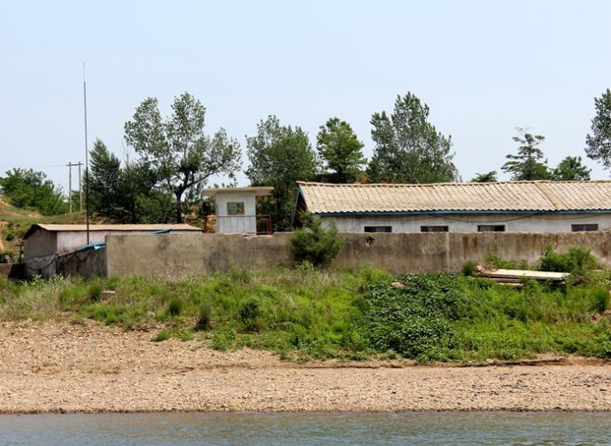 中朝边境美丽的风景,中朝边境桃花盛开的地方