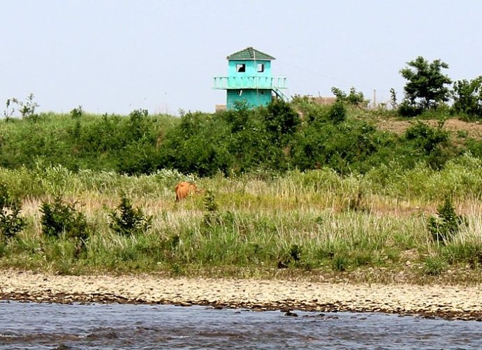 中朝边境美丽的风景,中朝边境桃花盛开的地方
