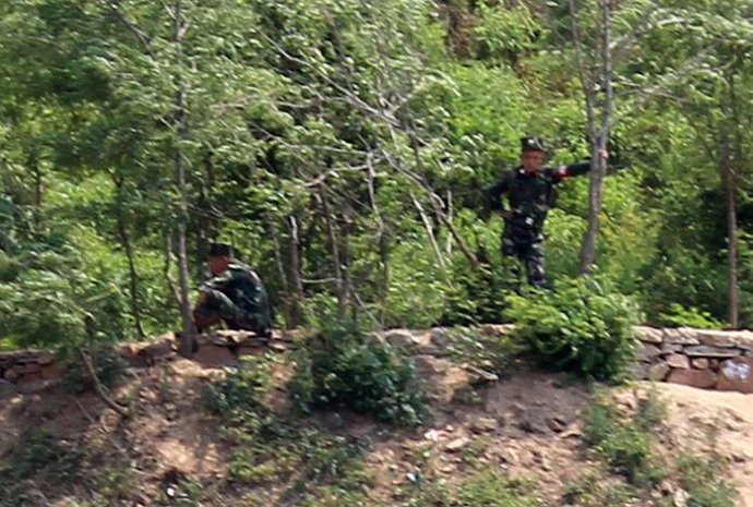 中朝边境美丽的风景,中朝边境桃花盛开的地方