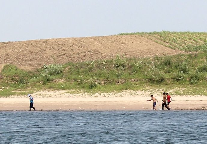 中朝边境美丽的风景,中朝边境桃花盛开的地方