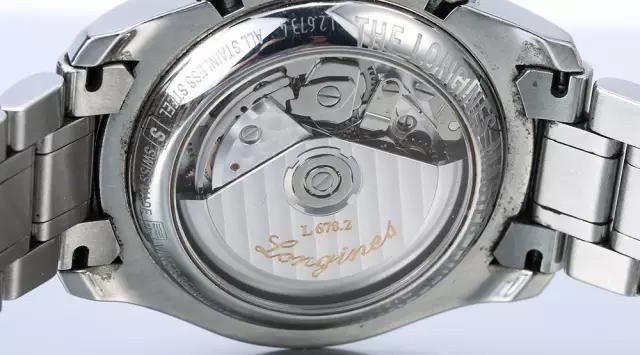 浪琴月相gs真假对比,浪琴手表质保卡真假图片对比