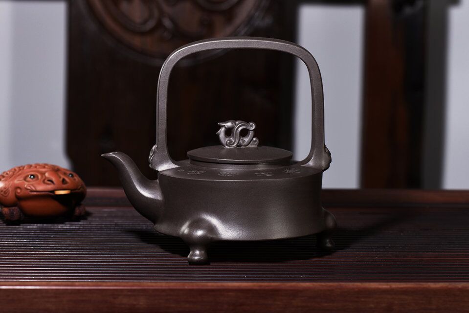 紫砂壶出水不畅怎么解决,紫砂壶压住盖子会出水不