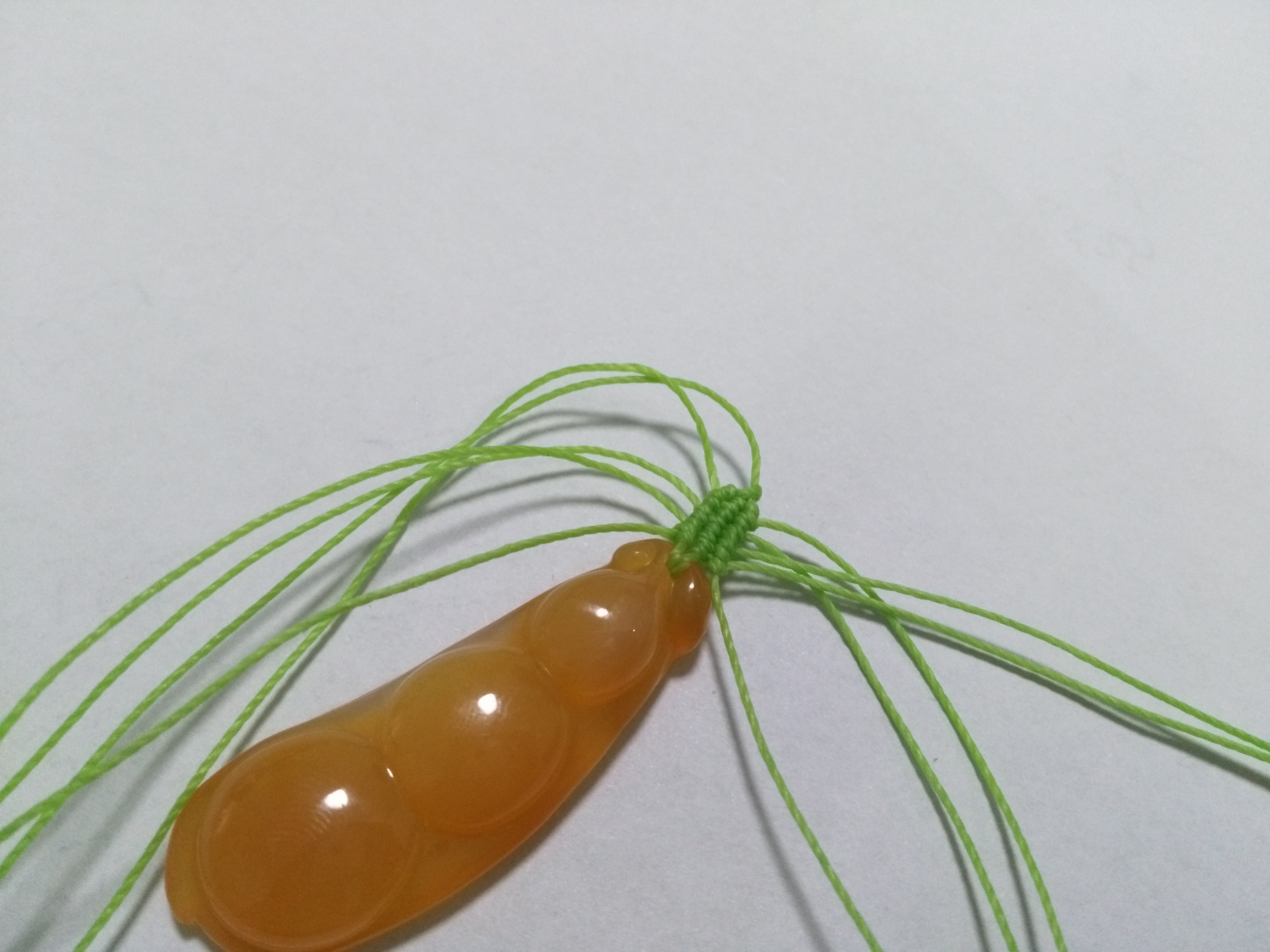 玛瑙豆子编手机吊坠法教程,玉豌豆吊坠怎么编绳