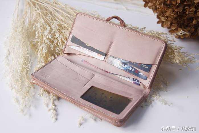 精致的手工小钱包,手拿的钱包