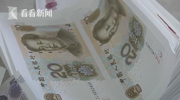 小伙嚣张曝光20万*币假**制作流程：手感特别棒