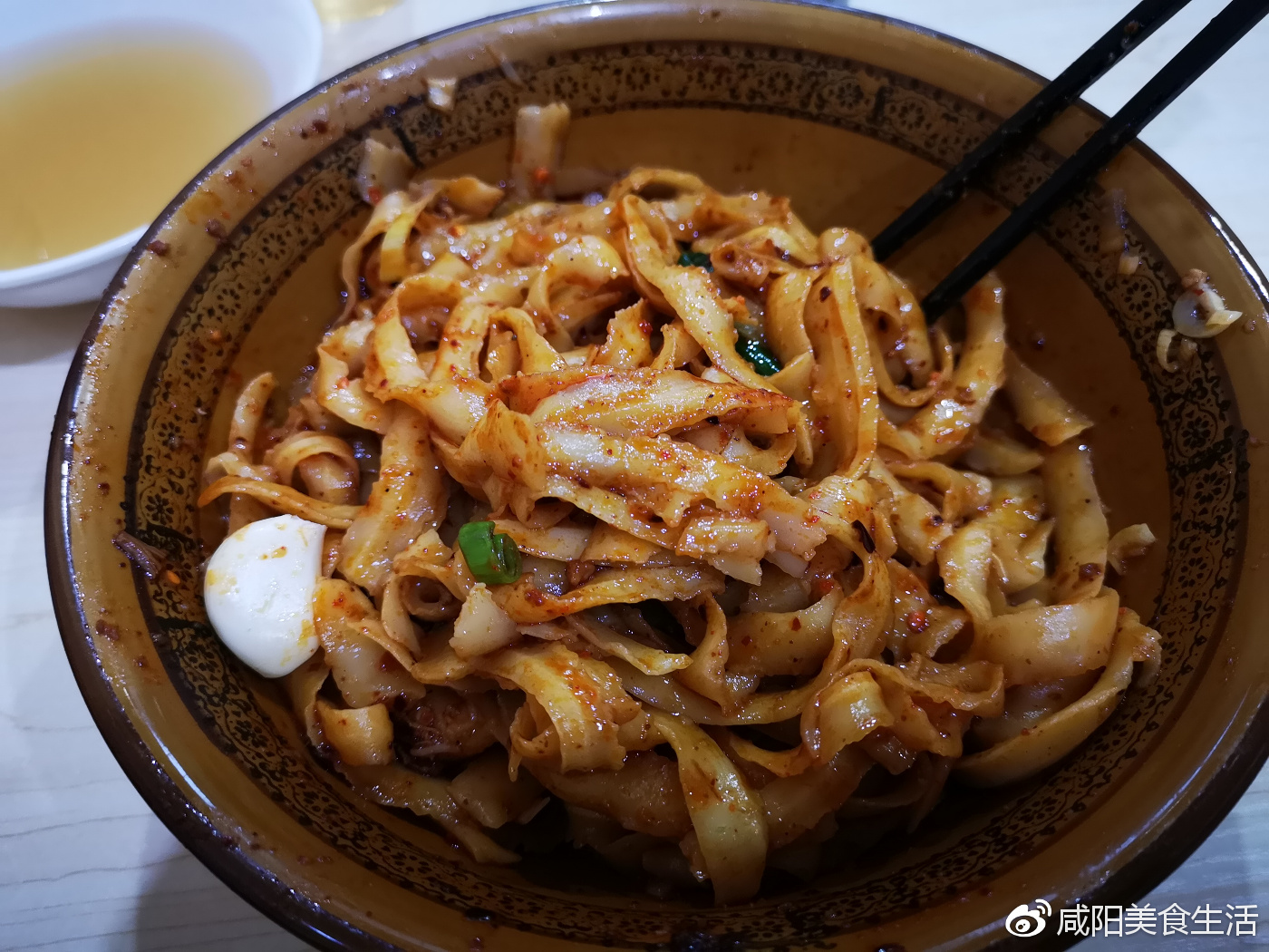 咸阳好吃的刀削面,咸阳美食探店红烧狮子头