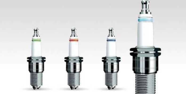 换原厂火花塞跟原厂代工区别,换火花塞贵还是换刹车油贵
