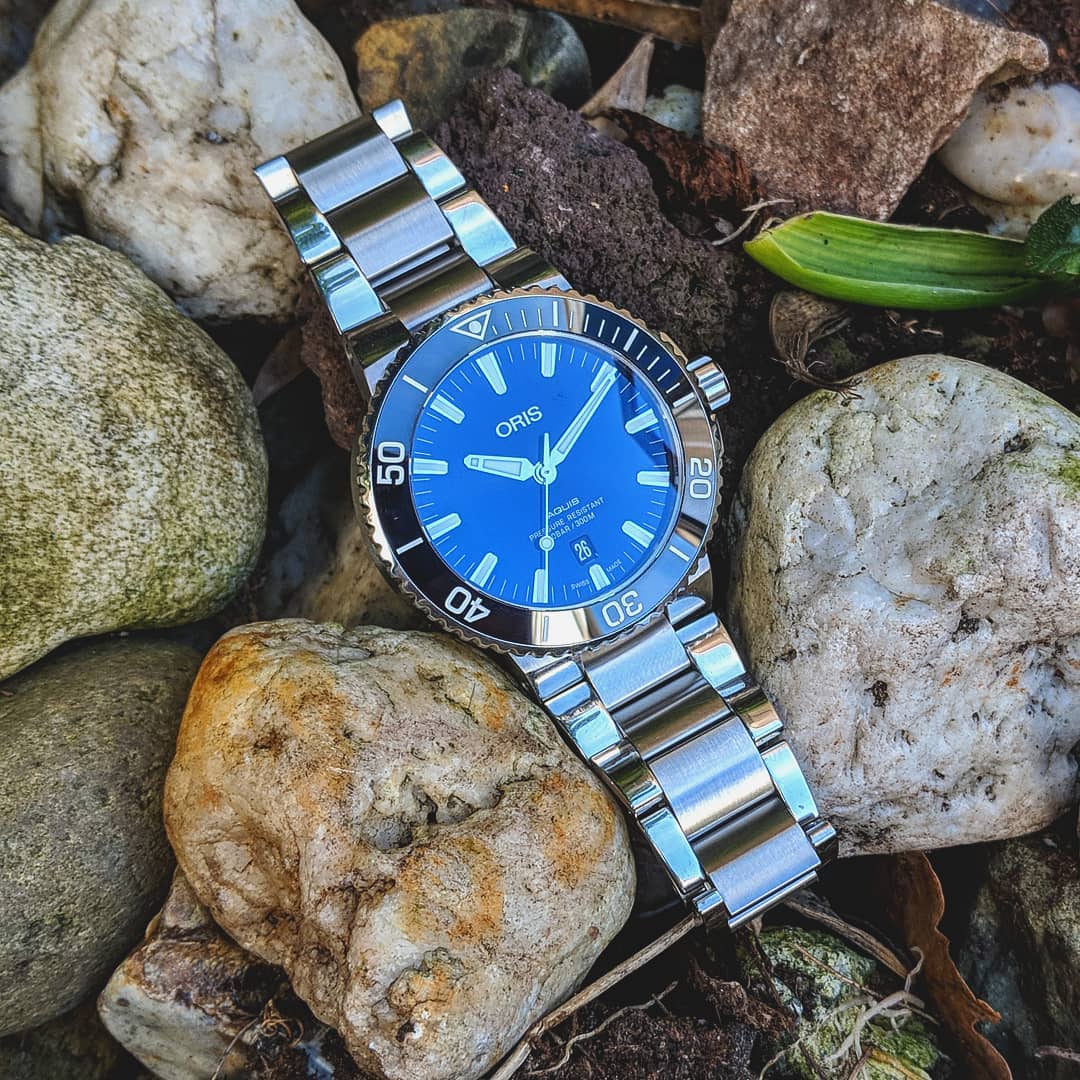 康卡斯和豪利时潜水表哪个好,绿水鬼掰手腕