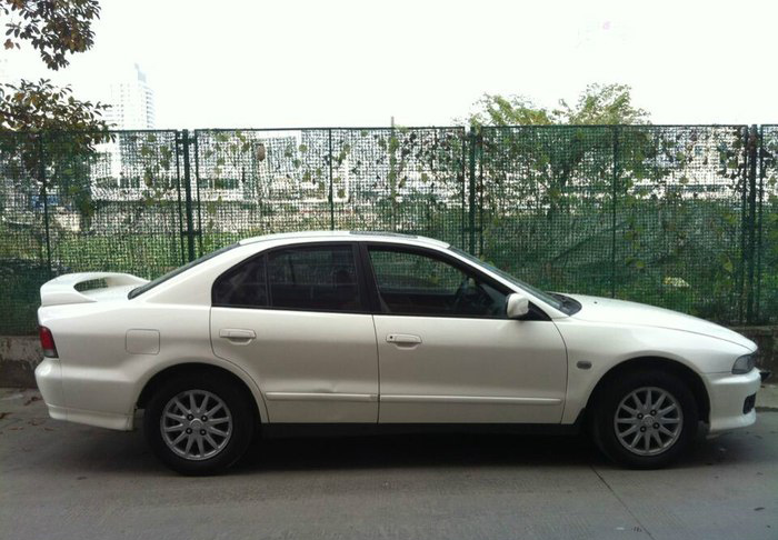 三菱戈蓝老款图片,三菱戈蓝八代鲨鱼头内饰