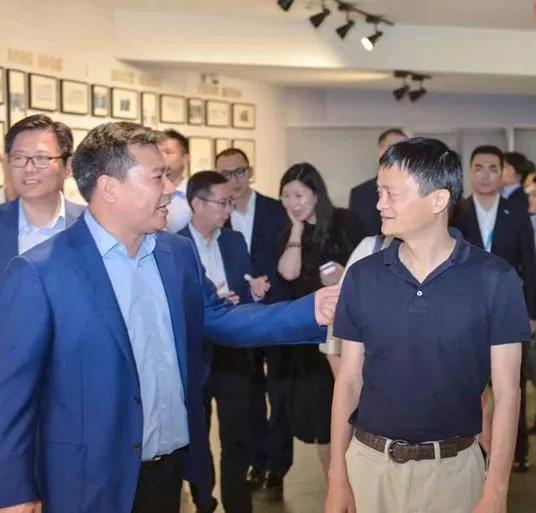 苏宁易购核心人物,苏宁董事长黄明端