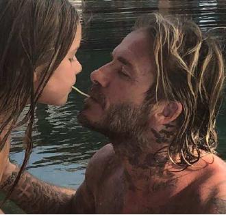 贝克汉姆维多利亚亲吻照,大卫贝克汉姆亲吻丽贝卡图片