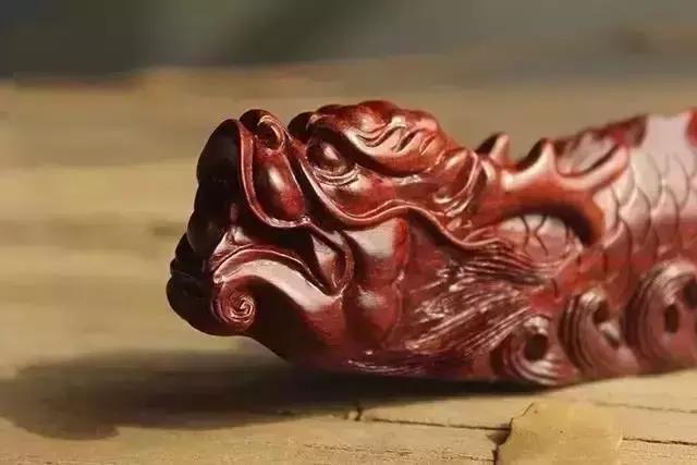 木雕兽头什么寓意,长颈鹿木雕婚礼摆件有什么寓意