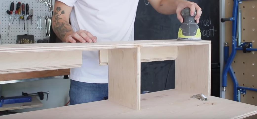 电视柜加隐形柜门一体效果图,悬空电视柜中间不做柜门好看吗