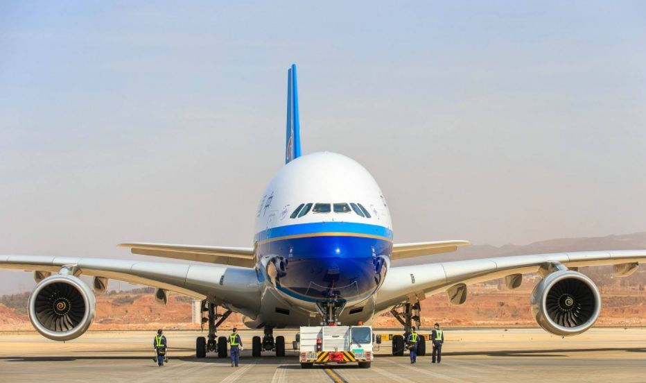 南航国际航空升舱要多少里程,国航与南航经济舱哪家好