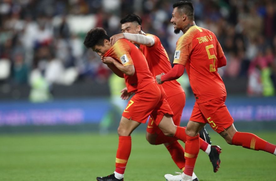 足球中的微笑瞬间,中国足球的泪水