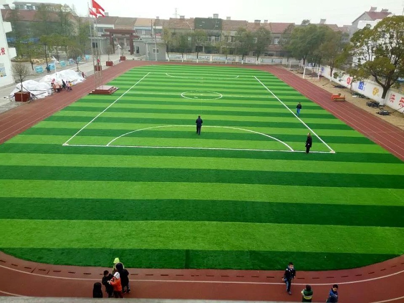 运动场地人造草坪施工方案,人造草坪体育场地建设