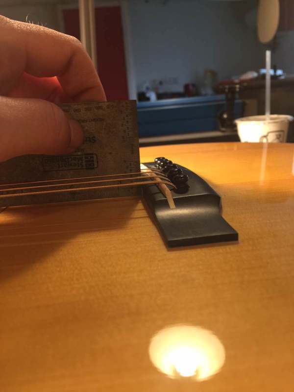 为什么磨了弦枕降低了弦距,感觉吉他的音色变差了?