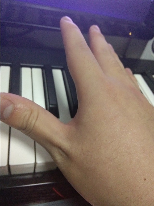 手小怎么弹八度,双八度怎么弹初学者