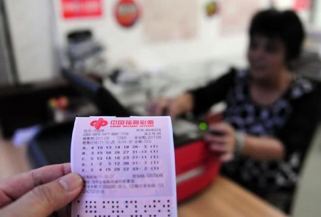 彩票中奖1000万要不要打电话,买彩票中奖了还能继续买吗