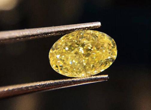 黄色钻石代表什么寓意,天然钻石和黄钻哪个更值钱