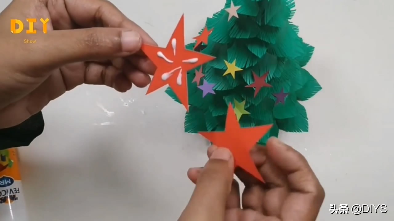 手工圣诞树剪纸制作幼儿园,四个圣诞树连在一起剪纸教程