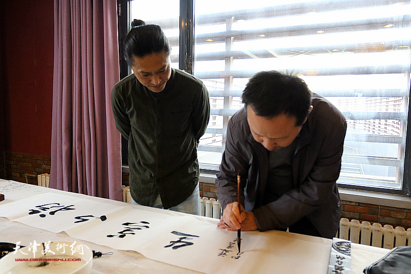 巨龙画院新春团拜活动在江泽福轩大饭店举行