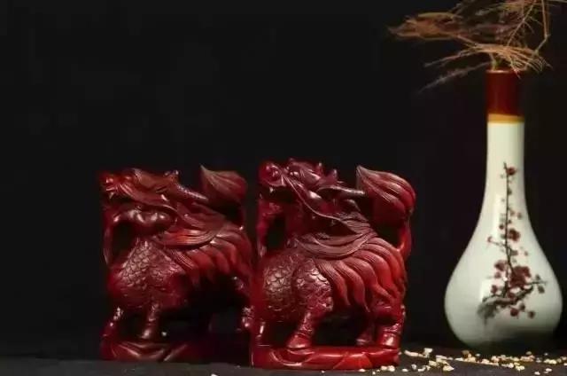 木雕兽头什么寓意,长颈鹿木雕婚礼摆件有什么寓意