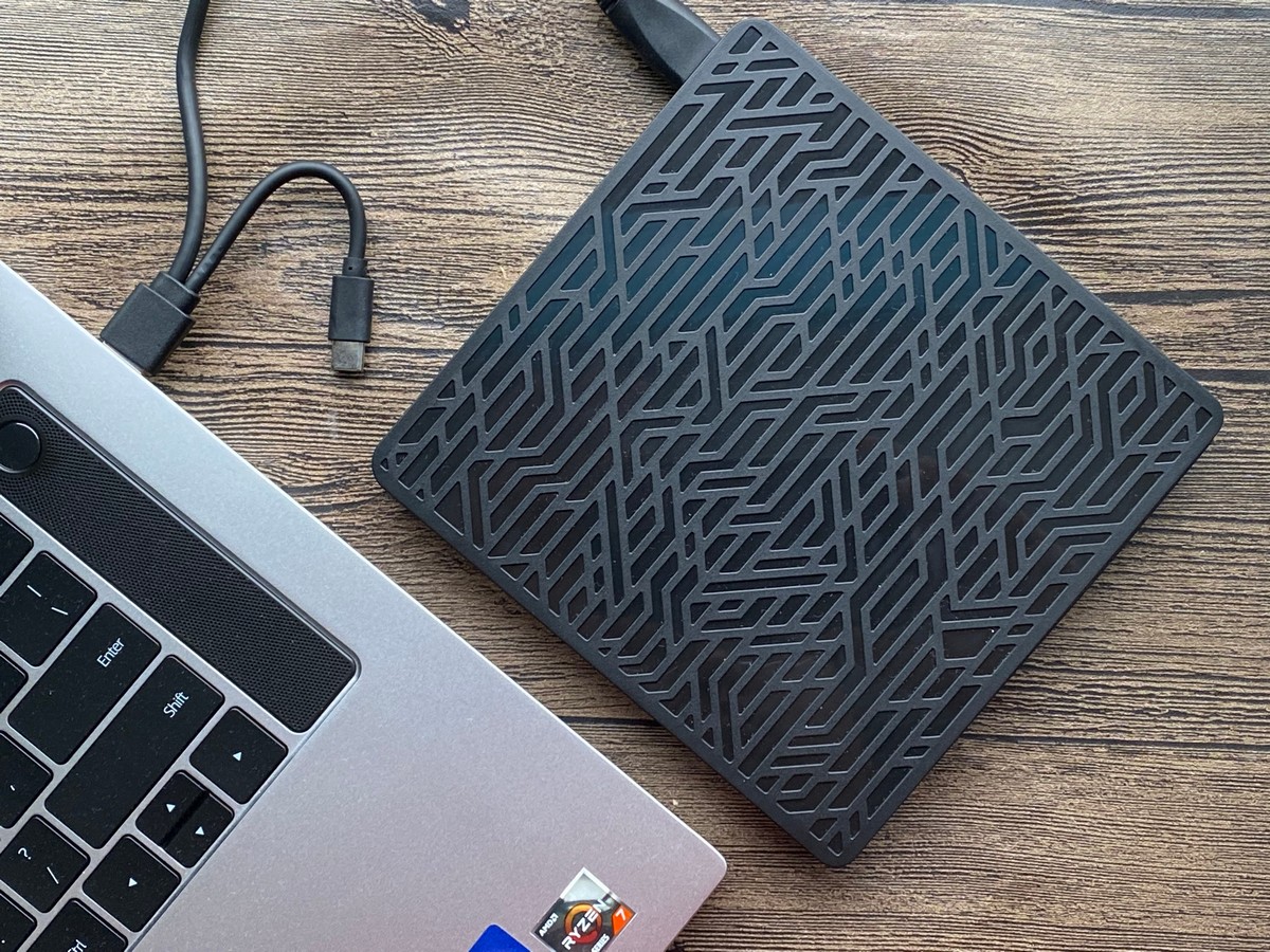 奥睿科外置光驱怎么放刻录盘,奥睿科三合一优盘解析