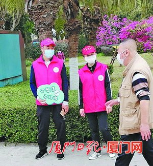 聚力战疫彰显志愿者最美担当