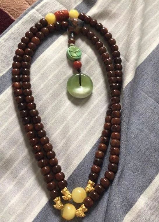 沉香手串包浆好还是不包浆好,怎样分辨包浆和不包浆的手串