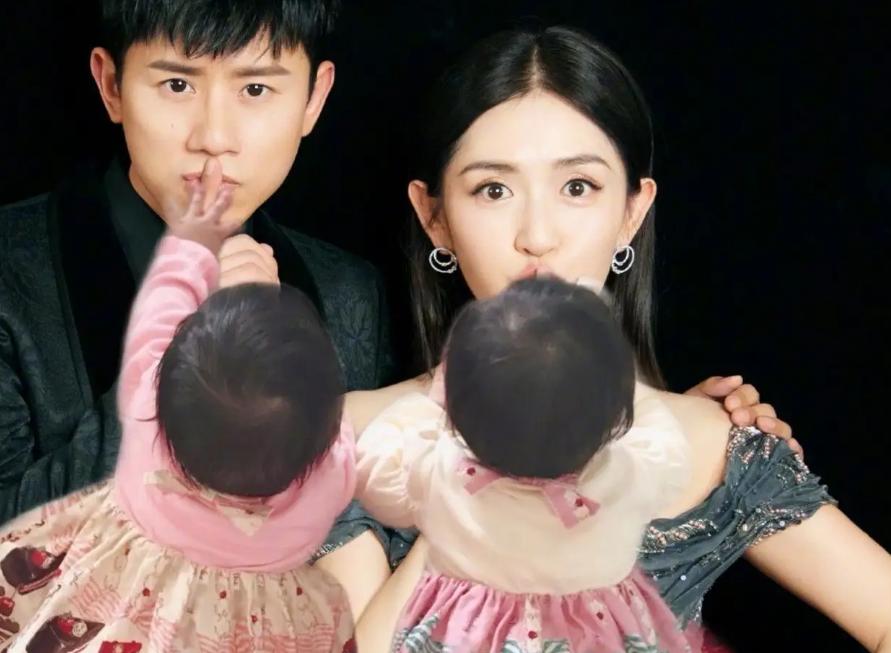 张杰演唱会一家三口亲吻,张杰谢娜一家五口现身游乐场