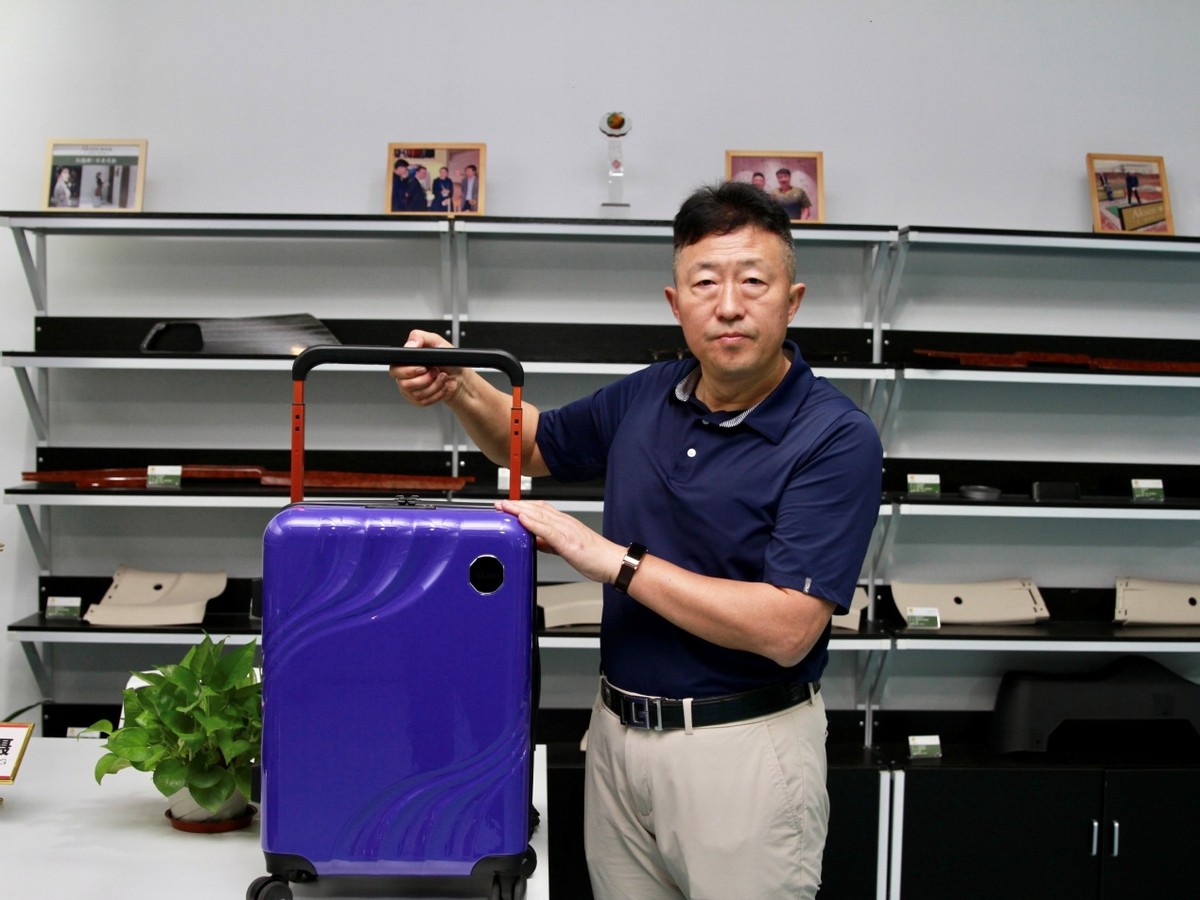 香港《经济导报》——奥凯盛箱包和陈来运先生的中国梦