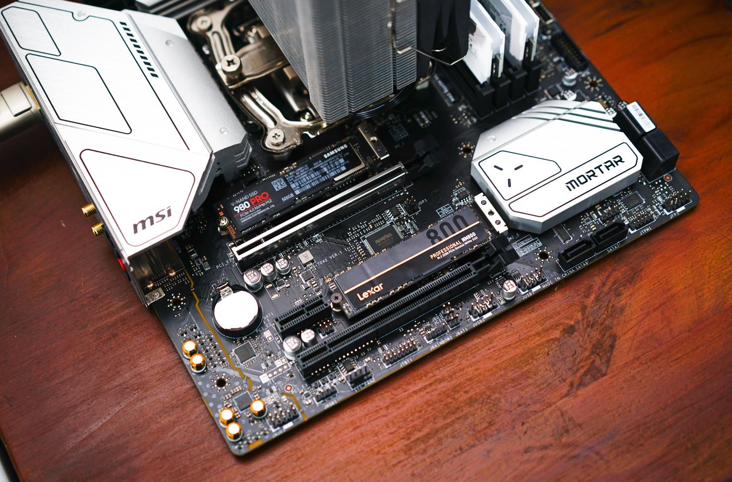 迫击炮b360主板固态散热片,b550迫击炮主板支持pcie4.0固态吗