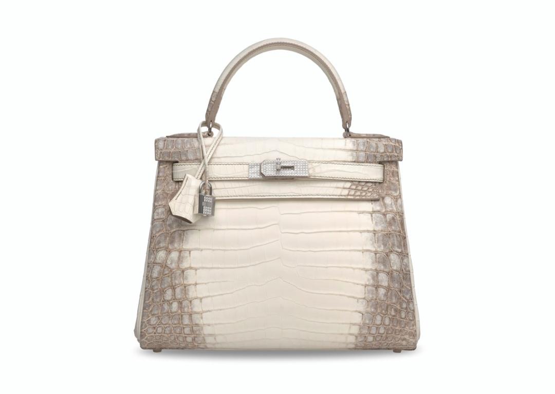 刘銮雄拍卖77个奢侈品包包,刘銮雄拍下的珠宝