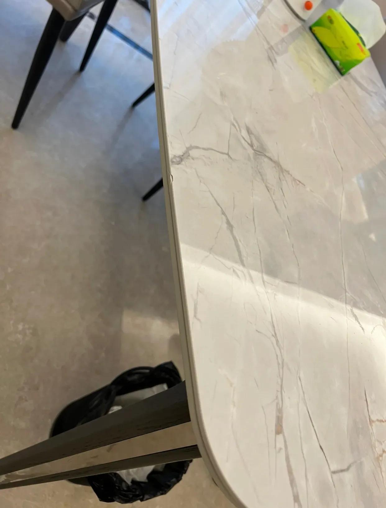 岩板餐桌跟天然石餐桌哪个好,七星石餐桌和岩板餐桌区别