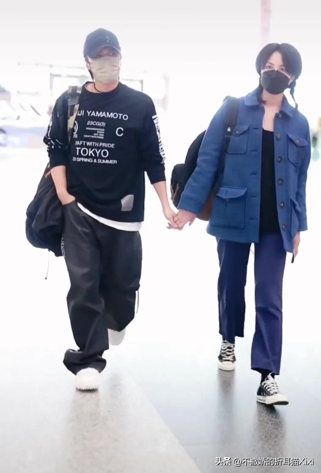 谢霆锋王菲时隔21年再现世纪牵手,王菲谢霆锋机场牵手完整版