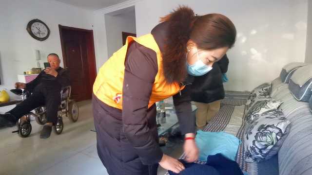 宁夏石嘴山市水城民生社区的志愿者“拿着”一把别人家的钥匙