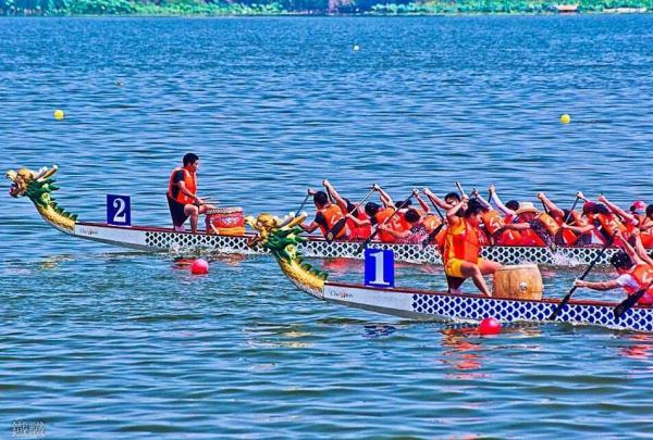 各地端午节习俗图片,各地端午龙舟赛火热开场