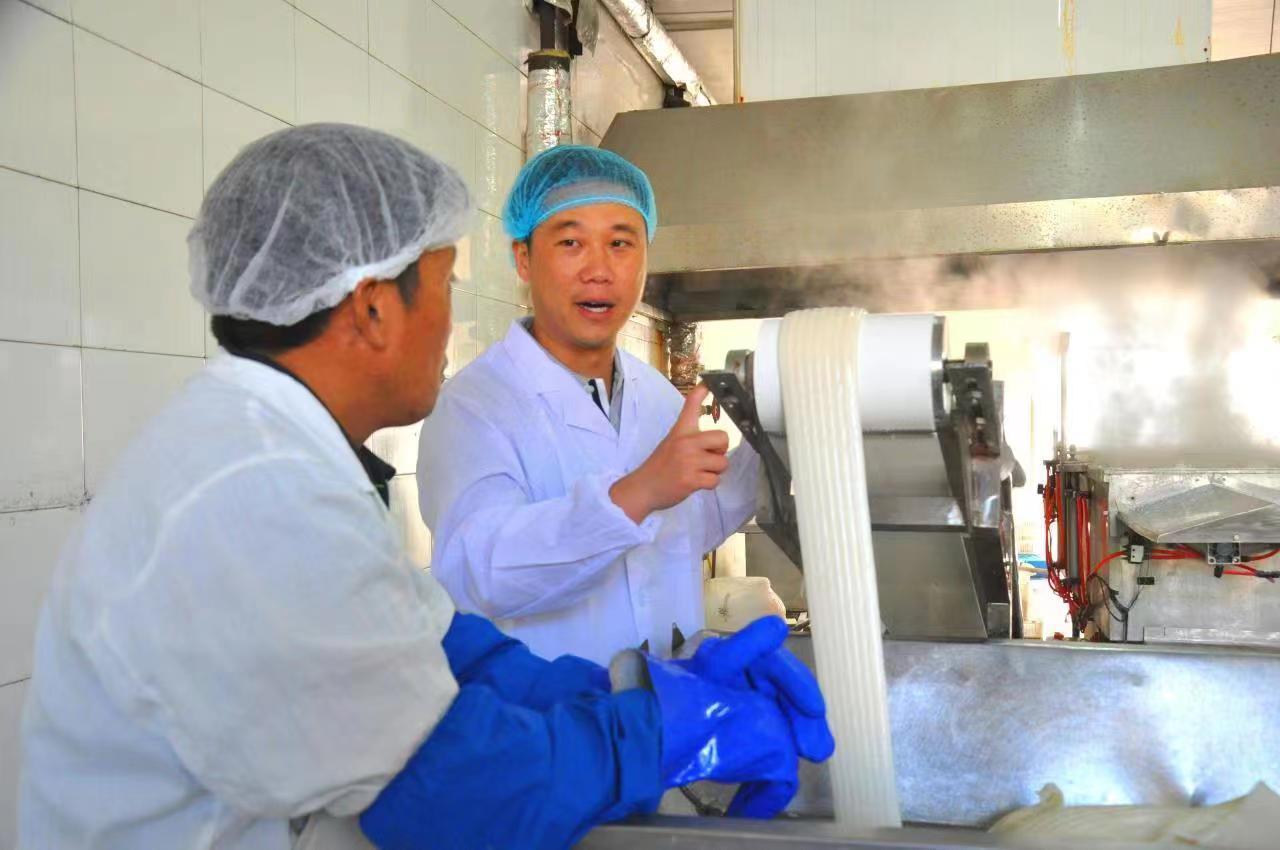 沈祥容：家乡办厂建基地年糕上网销全国