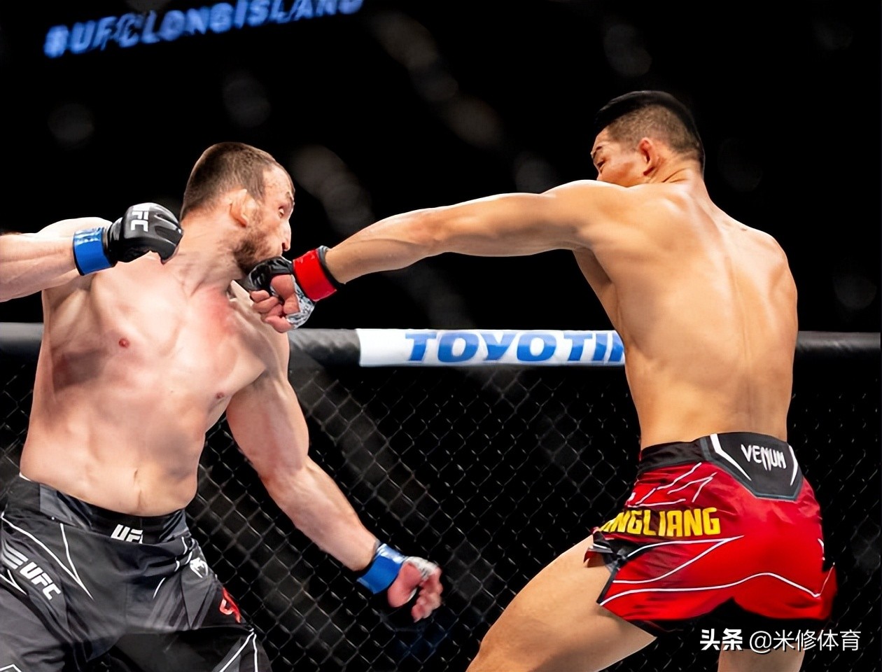 ufc李景亮ko桑托斯,ufc李景亮拿国旗