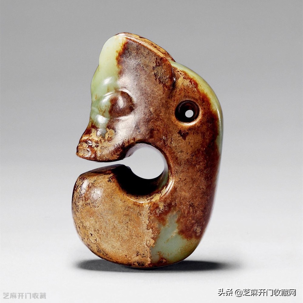 馆藏红山文化黄玉c型龙图片,红山玉器真品玉猪龙