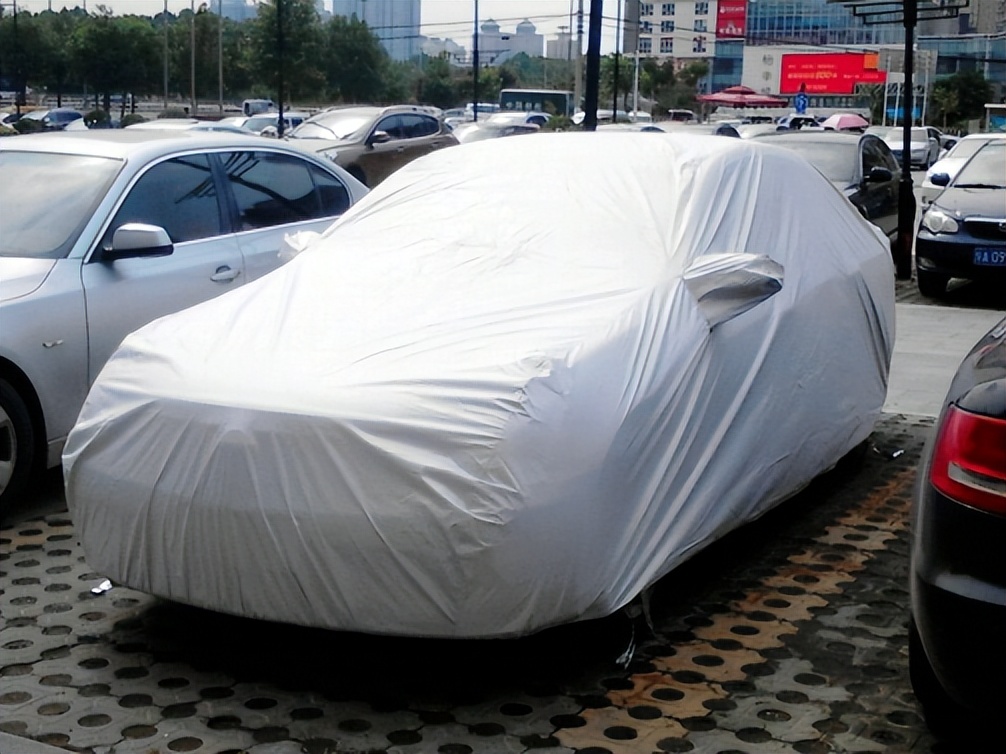 停车位罩车衣扣分吗,汽车停车罩车衣扣12分